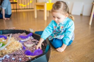 young girl with autism getting early intervention therapy